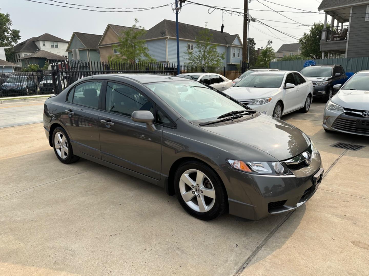 2010 Beige /Silver Honda Civic (2HGFA1F6XAH) , located at 1501 West 15th St., Houston, 77008, (713) 869-2925, 29.797941, -95.411789 - Photo#1